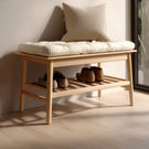 Compact wooden entry bench with cushioned seat and lower shoe shelf