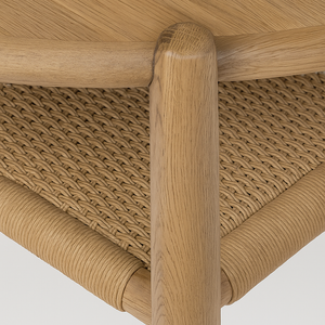 Farmhouse round wooden coffee table with lower shelf close up leg and shelf detail