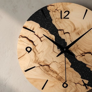 Marbled pattern circular wooden wall clock angled view highlighting pattern contrast