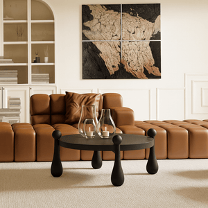 Modern round wooden coffee table with sculptural legs front view in living room