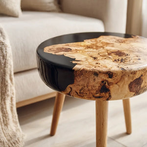 Close up view of round wooden resin tabletop showing natural wood grain and resin detail