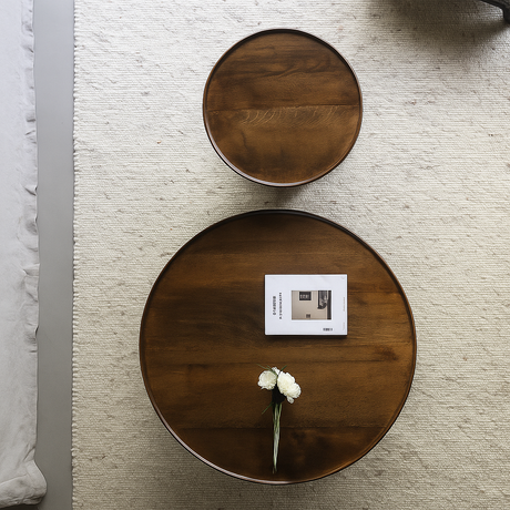 Scandinavian round wooden coffee table with thick legs top view showing tabletop