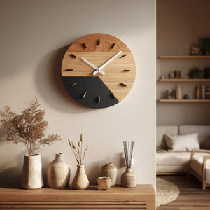 Two tone circular wooden wall clock mounted above console with decor items